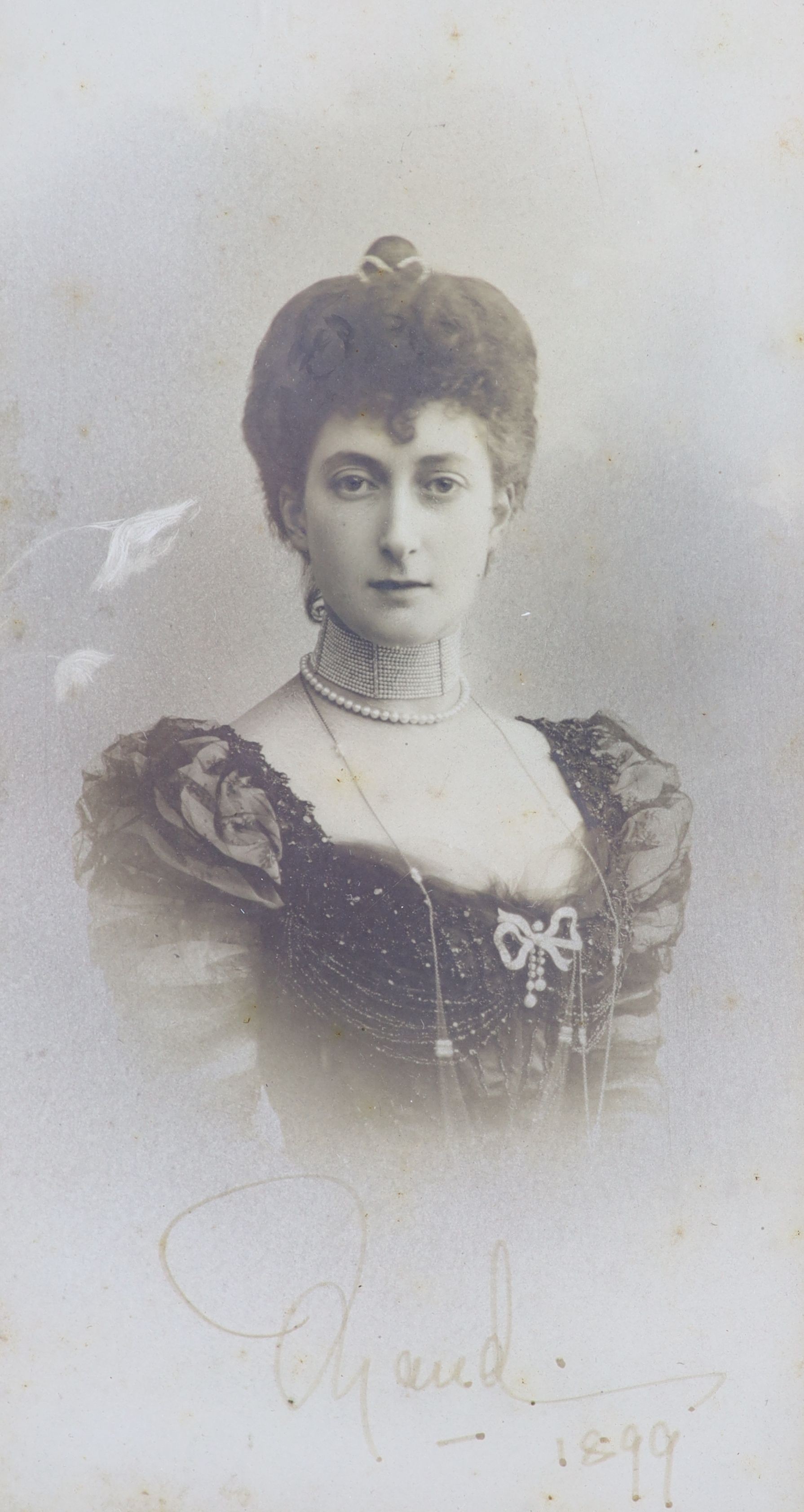 Maud of Wales (The Queen Consort of Norway), a signed portrait photograph, dated 1899 29 x 20cm.